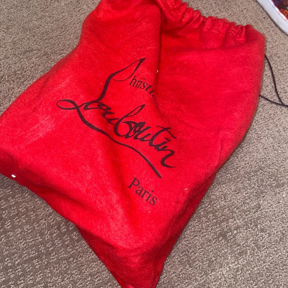 Beautiful Christian Louboutin sneakers Worn once. Dust bag available